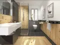 Salle de bain moderne avec murs en bois chaleureux, douche à l'italienne, lavabo suspendu et WC. L'ambiance naturelle du bois pour salle de bain invite à la détente.