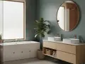 Salle de bain moderne avec baignoire, double vasque en bois clair et mur aux tons bleu-vert. La couleur salle de bain est apaisante.