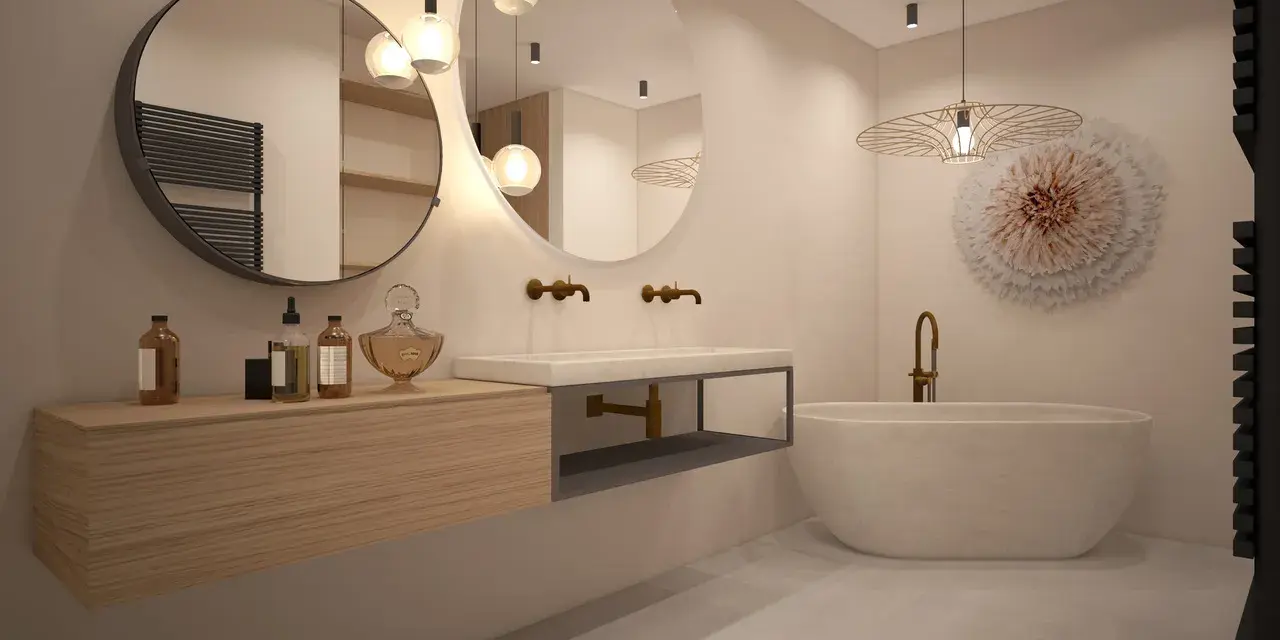 Salle de bain épurée avec baignoire îlot, double vasque et mobilier bois. Une vision de la tendance salle de bain 2026.