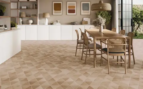 Salle à manger moderne avec sol carrelé géométrique. Poser du carrelage sur du carrelage peut présenter des inconvénients, mais ce sol est magnifique.