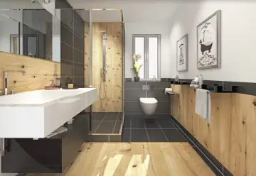 Salle de bain moderne avec murs en bois chaleureux, douche à l'italienne, lavabo suspendu et WC. L'ambiance naturelle du bois pour salle de bain invite à la détente.